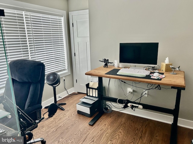 office space with hardwood / wood-style flooring