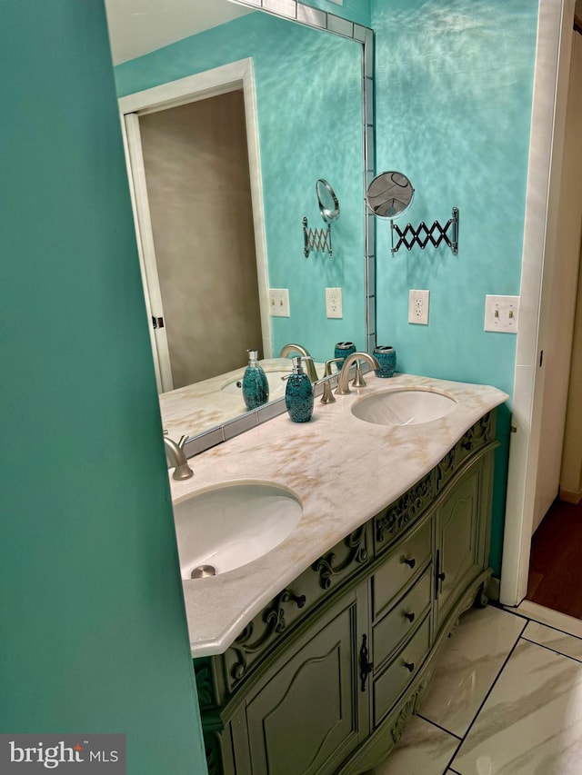 bathroom featuring tile patterned floors and vanity