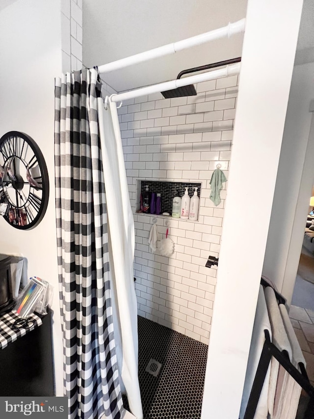 bathroom featuring walk in shower