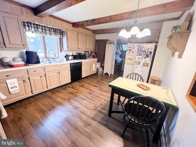 kitchen featuring sink, black dishwasher, white refrigerator with ice dispenser, a chandelier, and decorative light fixtures