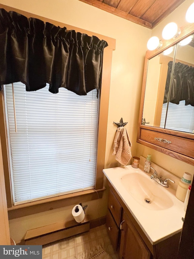 bathroom with vanity and wooden ceiling