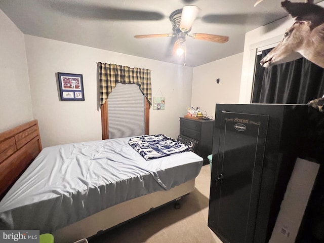 bedroom featuring carpet and ceiling fan