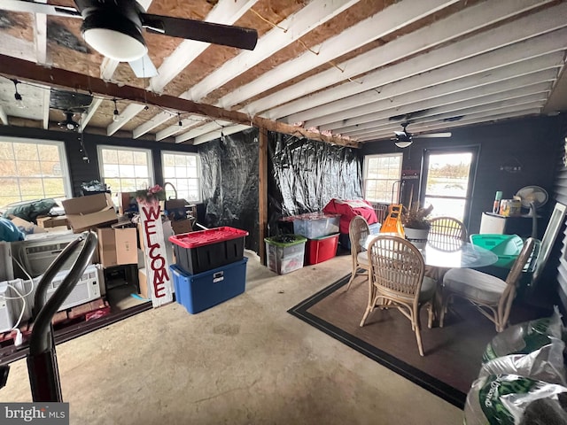 interior space featuring a wealth of natural light and ceiling fan