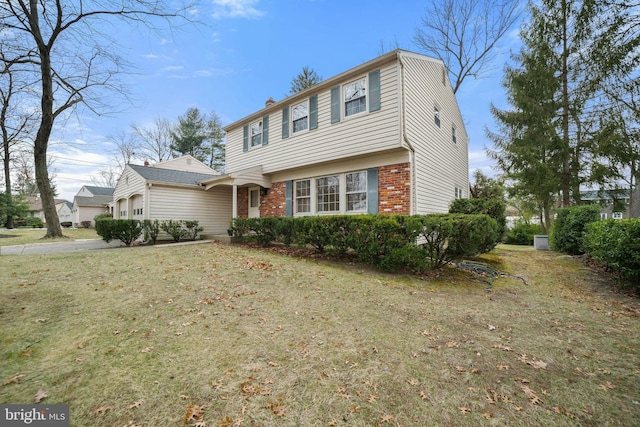 view of property with a front lawn