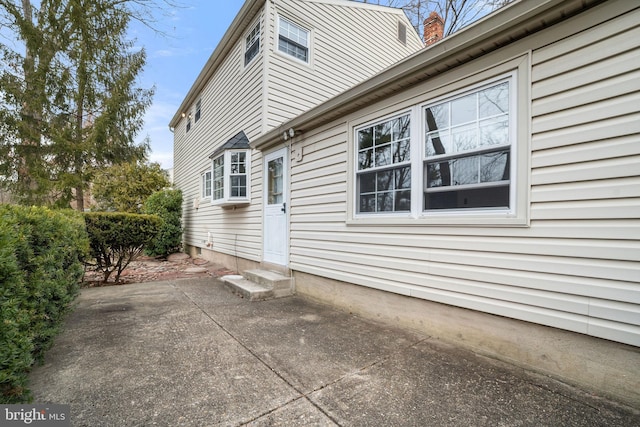 view of home's exterior with a patio area