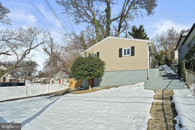 view of snow covered property