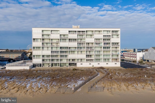 view of building exterior featuring a water view