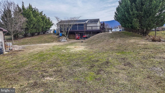 view of yard with a deck