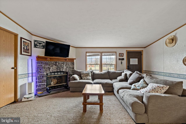 living room featuring carpet flooring, a stone fireplace, and ornamental molding