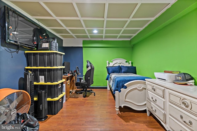 bedroom featuring wood-type flooring