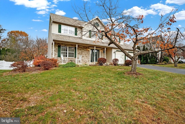 view of property featuring a front yard