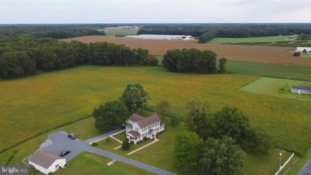 birds eye view of property featuring a water view and a rural view