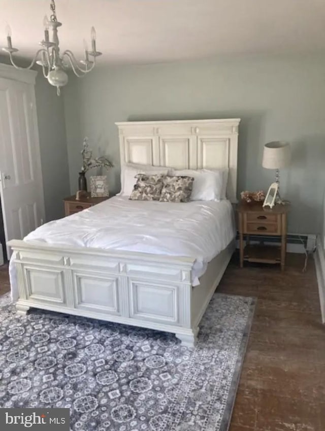 bedroom featuring a chandelier