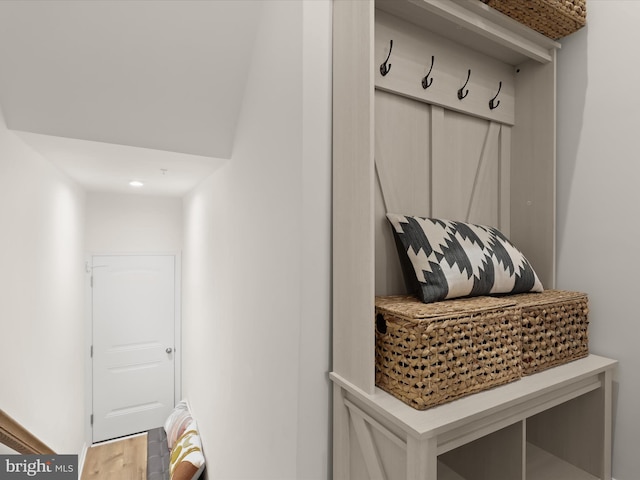 mudroom with light wood finished floors