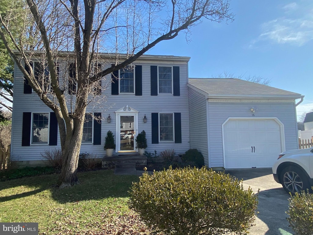 15 Morning Star Ct, Baltimore, MD 21206 - view of front of property with a garage, driveway, and a front lawn
