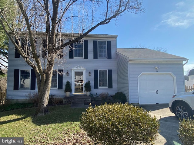 15 Morning Star Ct, Baltimore, MD 21206 - view of front of property with a garage, driveway, and a front lawn