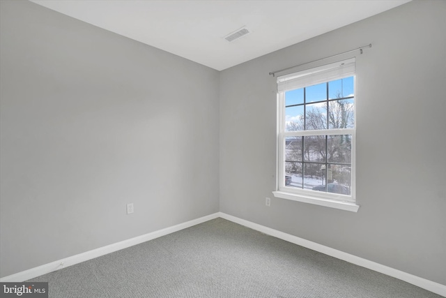 view of carpeted spare room