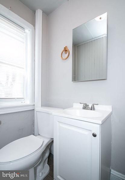 bathroom with vanity and toilet