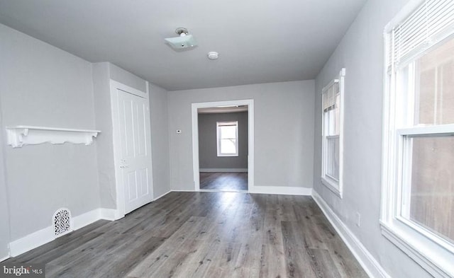 foyer entrance with hardwood / wood-style floors