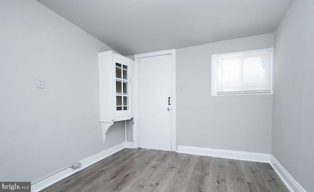 unfurnished room featuring light wood-type flooring