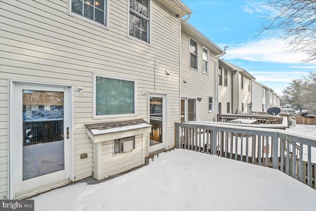 view of snow covered deck