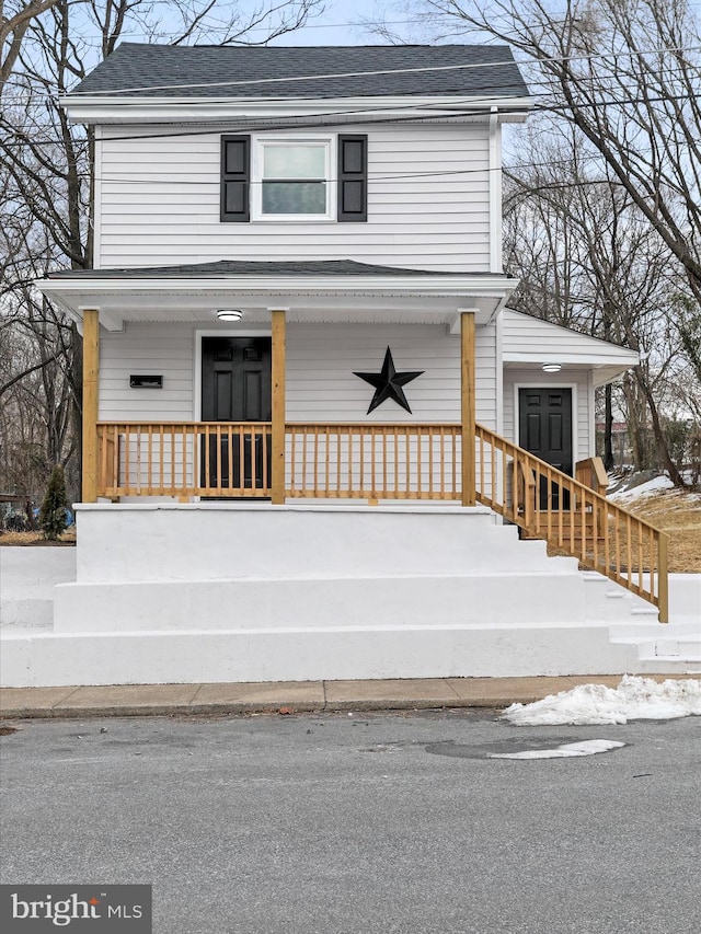 view of front of house with french doors and a porch