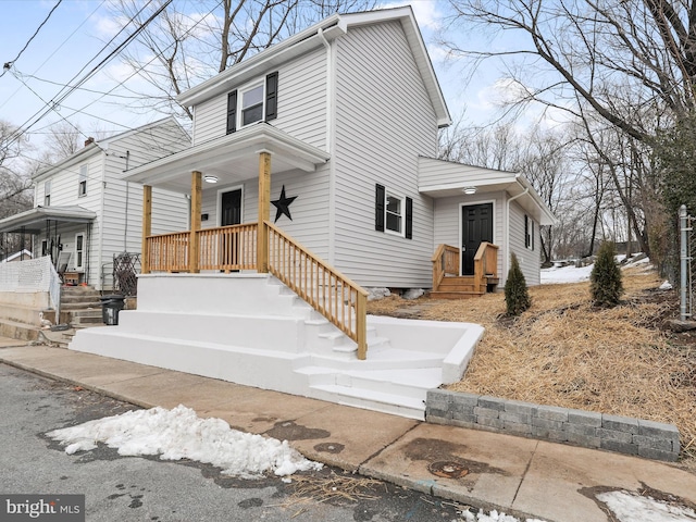 view of property with a porch