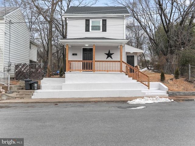 view of front property featuring a porch