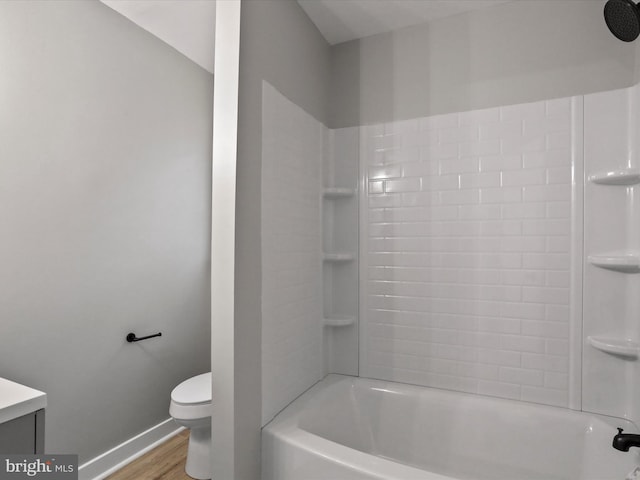 full bathroom with toilet, shower / bath combination, vanity, and hardwood / wood-style floors