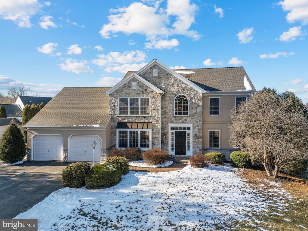 view of front property with a garage