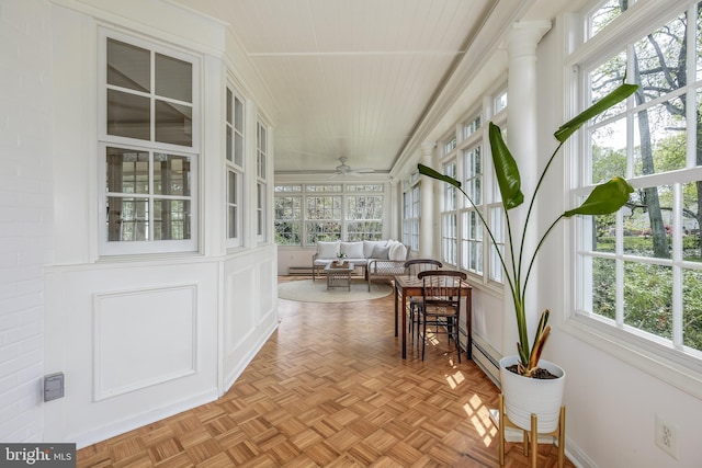 4901 Stillwell Ave, Alexandria, VA 22309 - sunroom featuring plenty of natural light and a baseboard radiator