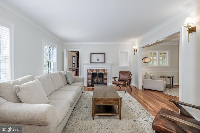 4901 Stillwell Ave, Alexandria, VA 22309 - living room with wood finished floors, a healthy amount of sunlight, and crown molding