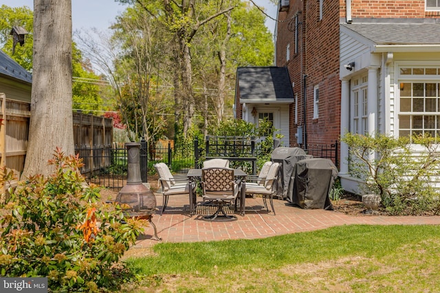 4901 Stillwell Ave, Alexandria, VA 22309 - view of patio featuring fence and outdoor dining area