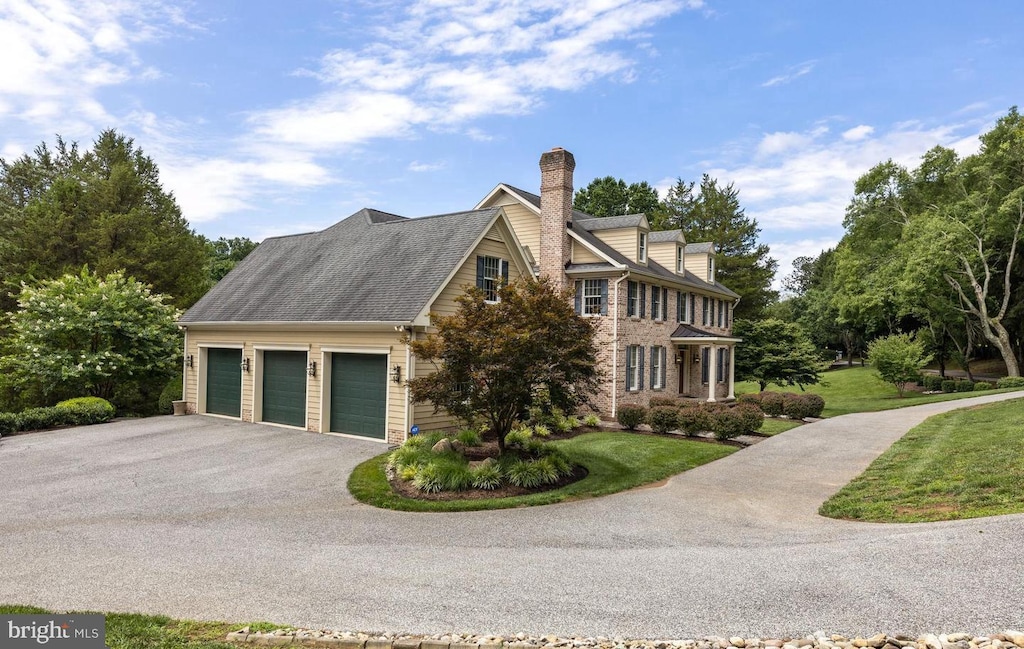 view of property exterior with a garage