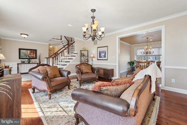 living room with an inviting chandelier, wood-type flooring, and ornamental molding