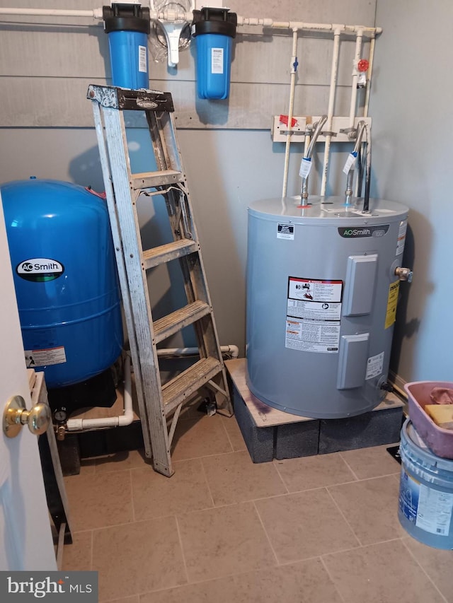 utility room featuring electric water heater