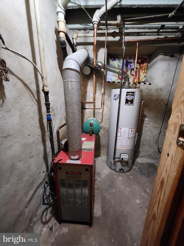 utility room with gas water heater