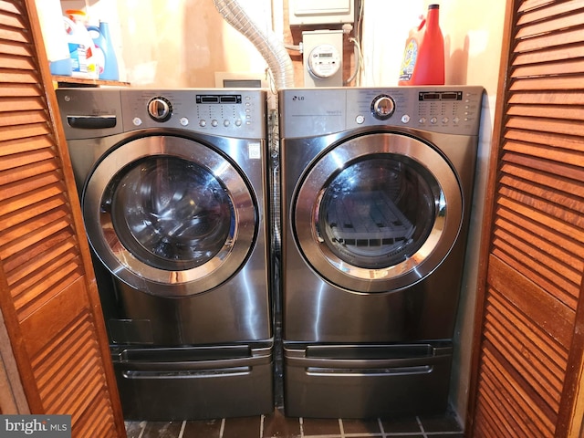 laundry area with separate washer and dryer