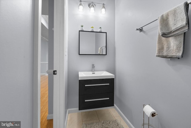 bathroom with tile patterned flooring and vanity