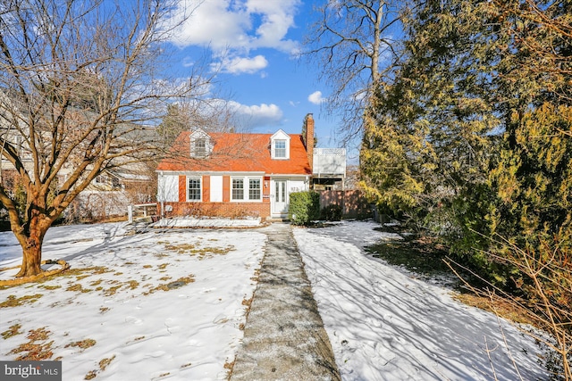 view of new england style home