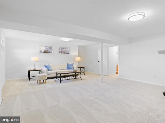 living area with light colored carpet