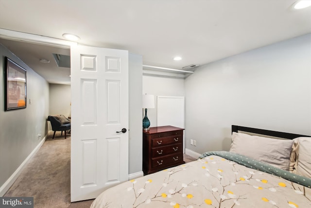 bedroom with light colored carpet