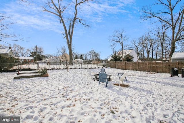 view of yard covered in snow