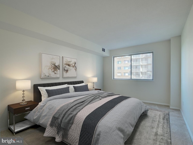 bedroom featuring carpet