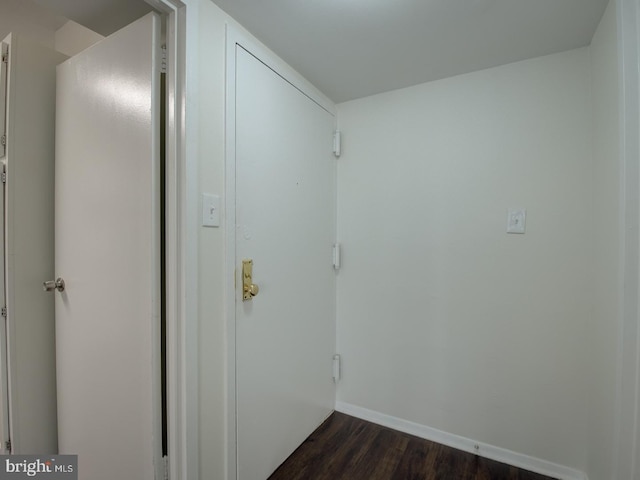 interior space with dark wood-type flooring