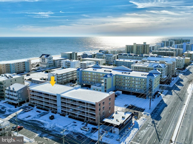 bird's eye view featuring a water view and a city view