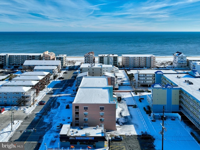 drone / aerial view with a water view