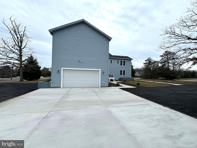 view of home's exterior featuring a garage