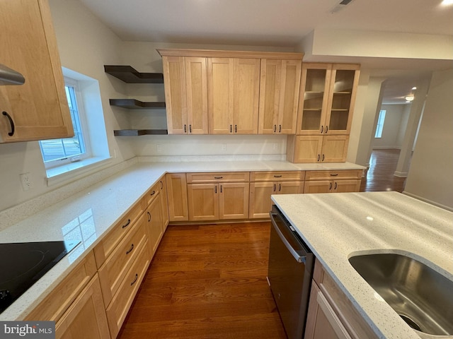 kitchen featuring sink, dishwasher, dark hardwood / wood-style floors, black stovetop, and light brown cabinetry