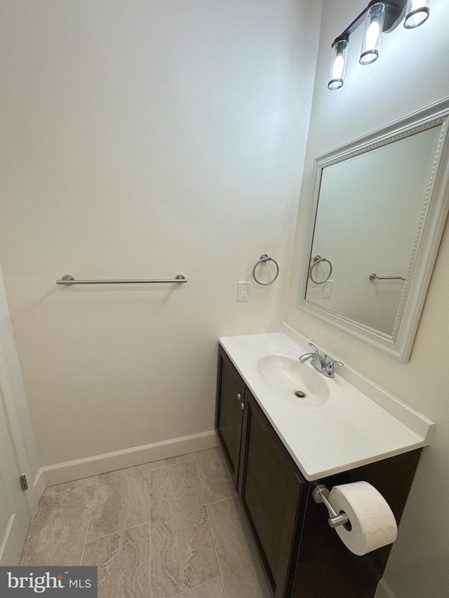 bathroom with vanity and tile patterned floors